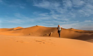Morocco desert tour sunset over golden dunes